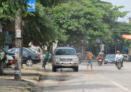 Tác hại từ các điểm rửa xe vỉa hè